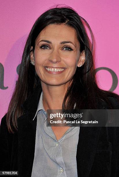 Adeline Blondieau poses during a photocall before the presentation of "The Passionata" collection on March 23, 2010 in Paris, France.