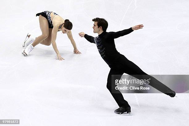 Jessica Dube and Bryce Davison of Canada compete in the Pairs Short Program during the 2010 ISU World Figure Skating Championships on March 23, 2010...