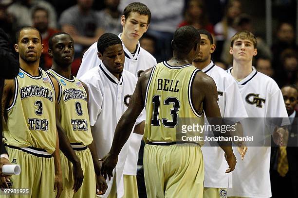 The Georgia Tech Yellow Jackets bench greets D'Andre Bell as he heads to the bench in the second half against the Ohio State Buckeyes during the...