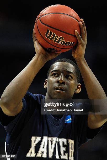 Jordan Crawford of the Xavier Musketeers shoots a free throw against the Pittsburgh Panthers in the second half during the second round of the 2010...