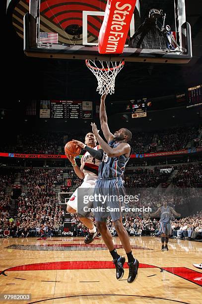 Jerryd Bayless of the Portland Trail Blazers goes to the basket against Nazr Mohammed of the Charlotte Bobcats during the game on February 1, 2010 at...