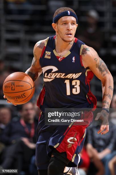Delonte West of the Cleveland Cavaliers handles the ball against the Milwaukee Bucks during the game on March 6, 2010 at the Bradley Center in...
