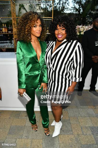 Serayah McNeill and Amber Riley attends the Debra Lee Pre-BET Awards Dinner at Vibiana on June 20, 2018 in Los Angeles, California.