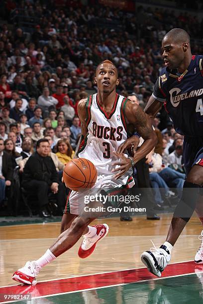 Brandon Jennings of the Milwaukee Bucks drives to the basket against Antawn Jamison of the Cleveland Cavaliers during the game on March 6, 2010 at...