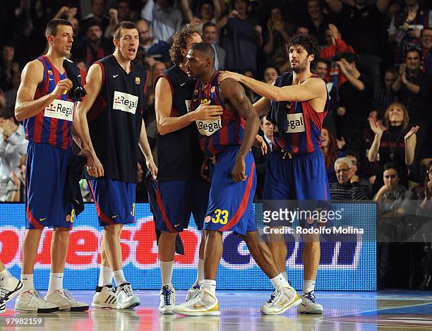 Pete Mickeal, #33 of Regal FC Barcelona celebrates with teamates during the Euroleague Basketball 2009-2010 Play Off Game 1 between Regal FC...