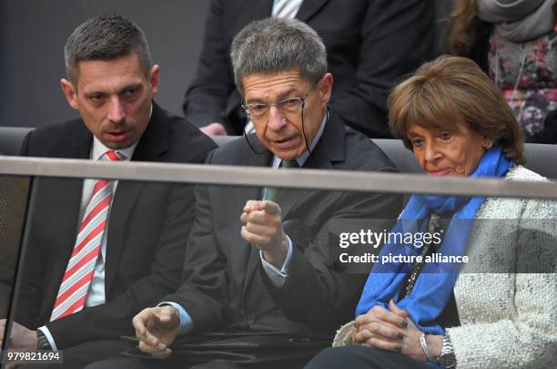 March 2018, Germany, Berlin: Daniel Sauer, Merkel's husband Joachim Sauer and Charlotte Knobloch sitting in the gallery at the election of the German...