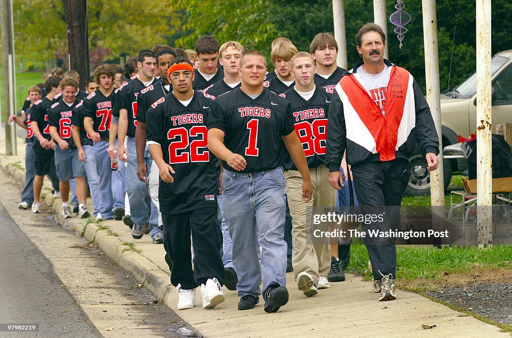 Before home games the Brentsville High School football team, wearing