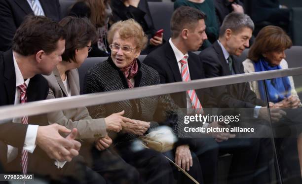 March 2018, Germany, Berlin: L-R government spokesman Steffen Seibert, office manager Beate Baumann, Herlind Kasner, mother of German Chancellor...