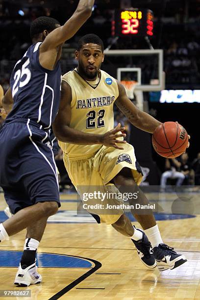 Brad Wanamaker of the Pittsburgh Panthers drives on Dante Jackson of the Xavier Musketeers during the second round of the 2010 NCAA men's basketball...