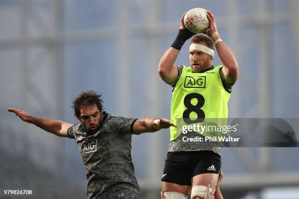 Sam Whitelock and Kieran Read of the All Blacks practice the lineout during a New Zealand All Blacks training session at Forsyth Barr Stadium on June...