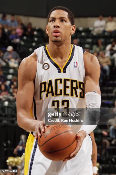 Danny Granger of the Indiana Pacers shoots a free throw against the Detroit Pistons during the game on March 19, 2010 at Conseco Fieldhouse in...