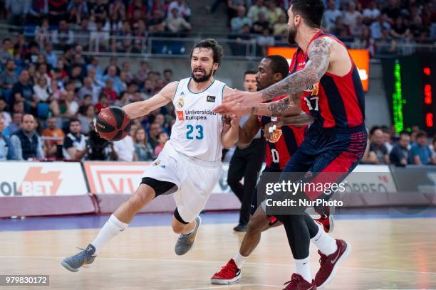 Real Madrid Sergio Llull and Kirolbet Baskonia Rodrigue Beaubois and Vincent Poirier during Liga Endesa Finals match between Kirolbet Baskonia and...