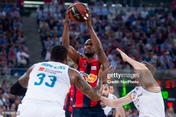 Real Madrid Trey Thompkins and Fabien Causeur and Kirolbet Baskonia Rodrigue Beaubois during Liga Endesa Finals match between Kirolbet Baskonia and...