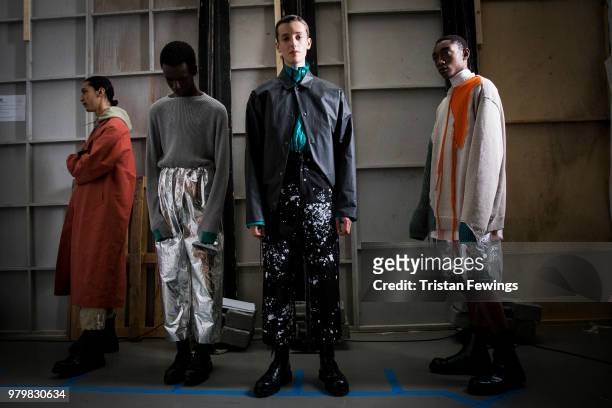 Models pose backstage prior the OAMC Menswear Spring Summer 2019 show as part of Paris Fashion Week on June 20, 2018 in Paris, France.