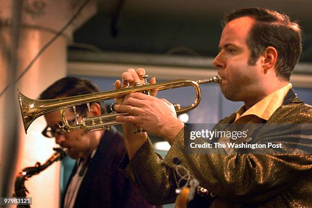 Dec. 31, 2005 Slug: ax-first sassignment Alexandria, VA "First Night Festivities" Photographer: Gerald Martineau Chris Watling with Saxaphone and...