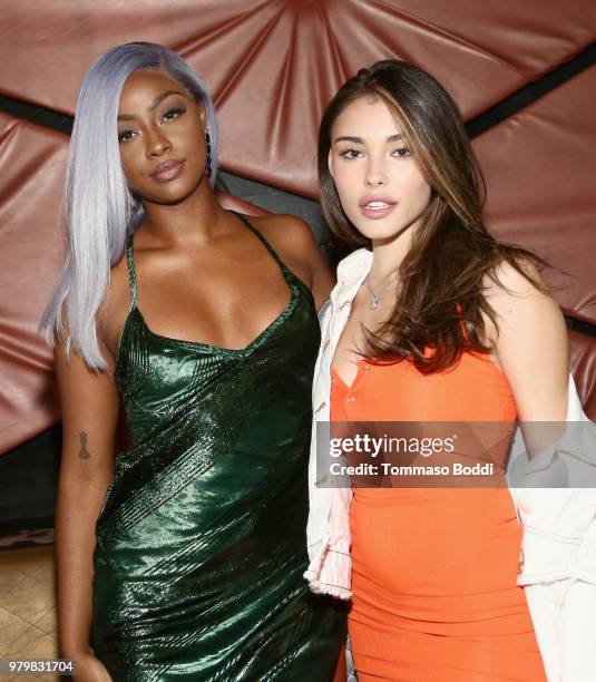 Justine Skye and Madison Beer attend Amber Rose x Simply Be Launch Party at Bootsy Bellows on June 20, 2018 in West Hollywood, California.