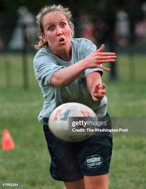 Amy Farrell pitches the ball to another team mate during Washington Furies Rugby team practice. Original Filename: furies1.jpg