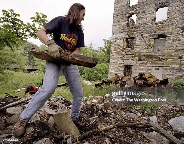 The Beverly Mill, a landmark stone structure originally dating from 1742, was torched by arsonists in 1998. Eileen Vreoom of the 'Turn the Mill...