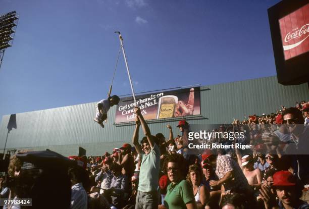 Fans cheer during the Boston Red Sox game against the New York Yankees at Fenway Park on October 2, 1978 in Boston, Massachusetts.