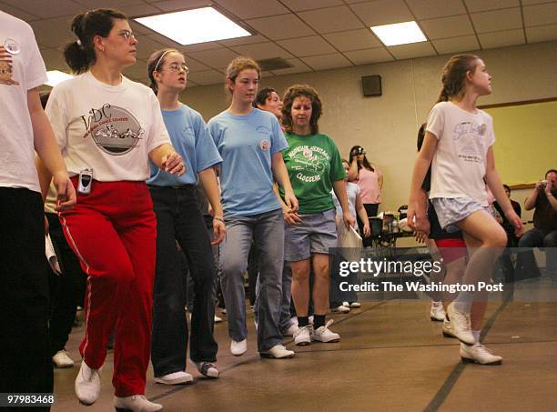 Pairs of feet tapped, stomped, and twirled at the 3rd annual Potomac Double Down clogging workshop at Pace Elementary School in Haymarket, VA. The...