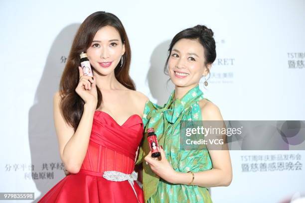 Actress Lin Chi-ling and actress Zhang Ting attend a promotional event of skincare brand TST on June 20, 2018 in Nanjing, Jiangsu Province of China.