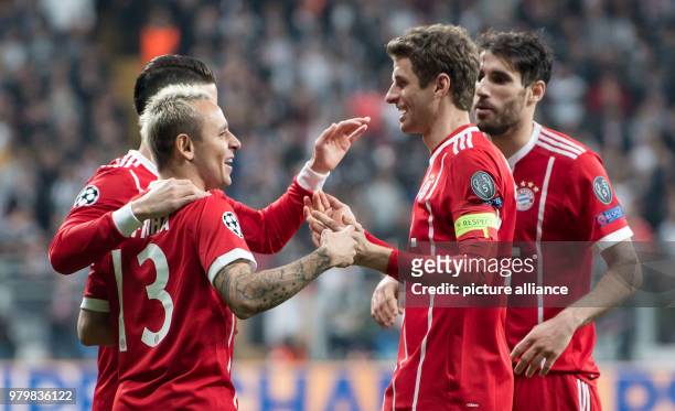 Munich's James Rodriguez , Rafinha, Thomas Mueller and Javi Martinez celebrate their side's 2nd goal during the UEFA Champions League round of 16...