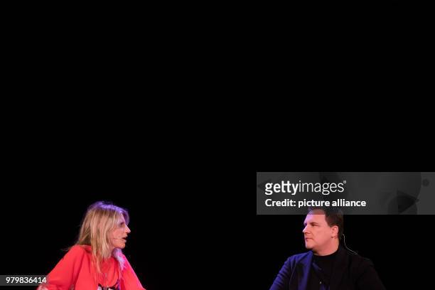 March 2018, Germany, Cologne: The fashion designer Guido Maria Kretschmer and the fashion journalist Antje Wewer sit on stage in the course of the...