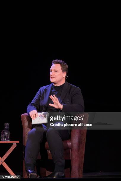 March 2018, Germany, Cologne: The fashion designer Guido Maria Kretschmer sits on stage in the course of the literature festival Lit.Cologne....