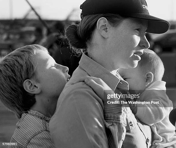 The USS Theordore Roosevelt departs from Norfolf Naval Station. Crew member Marie Forkin , says goodbye to her family. Cameron 10 and daughter...