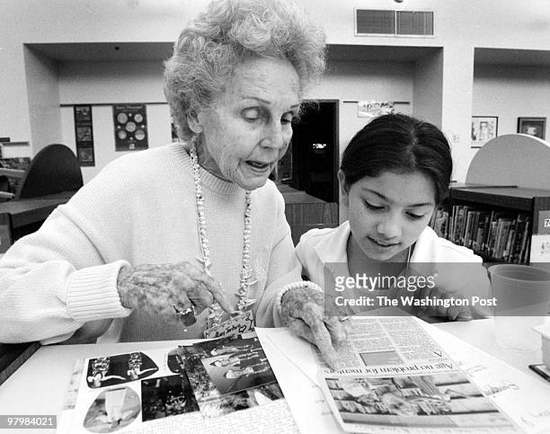 Stories- Mary Jenkins, left, shares some of her history with Barrett Elementary School 4th grader Brenda Rodriguez as part of a "Swapping Stories"...