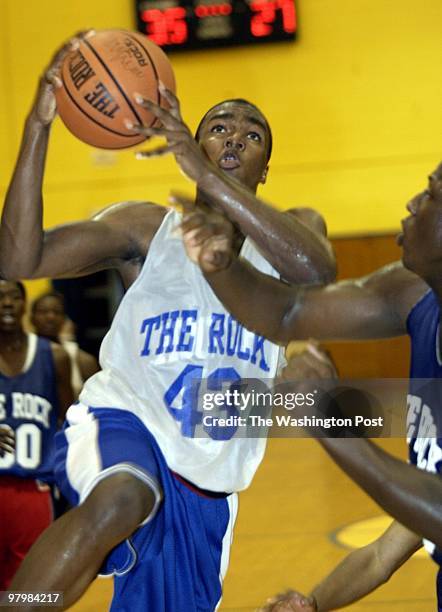 06/12/03 PHOTO BY: JOEL RICHARDSON 143349 THE ROCK SUMMER LEAGUE STARTS AT HIGH POINT HIGH SCHOOL ,,,SPRINGBROOK VS DEMATHA ,,, SPRINGBROOK'S FLOANN...