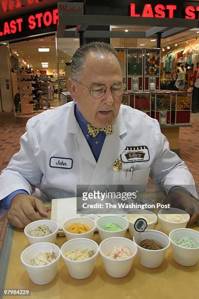 IceCream- John Harrison, Edy's Ice Cream offical taster, checks out the quality of their product at the Ice Ice Baby stand in Wheaton Plaza....