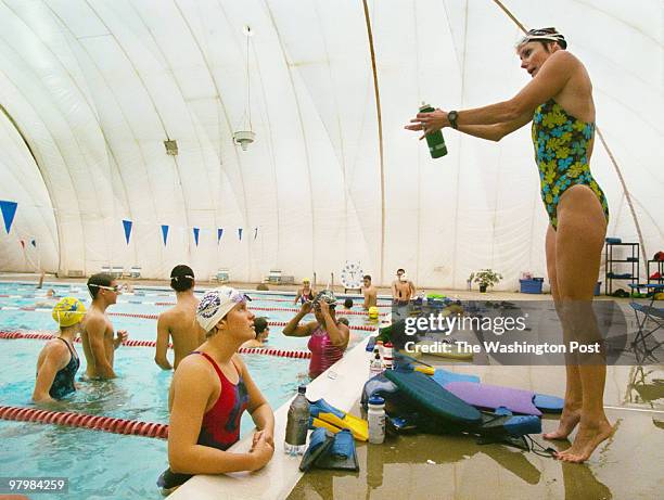 Swim18 10/14/01 Jahi Chikwendiu/TWP Beth O'Connor Baker right, who is a member of both the Virginia Masters Swim Team and a swim team called...