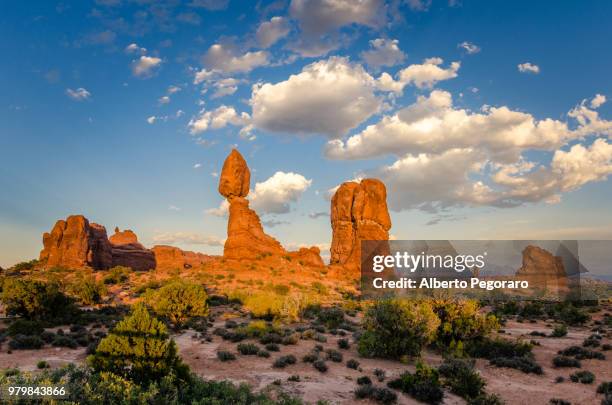 balanced rock at sunset, arches national park, utah, usa - balanced rock arches national park stock pictures, royalty-free photos & images