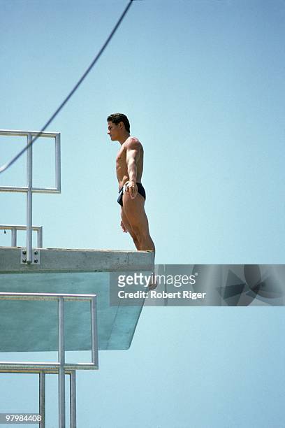Greg Louganis competes in a diving competition in a photo dated July 1983.