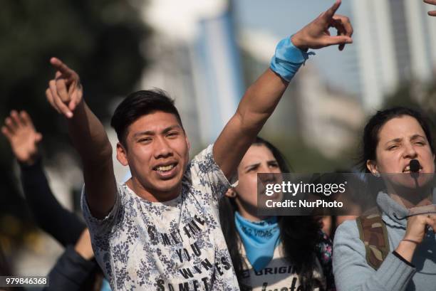 People demonstrate in rejection of the decriminalization of abortion in Buenos Aires, Argentina, on 20 June 2018 with the 'save the two lives'. A...