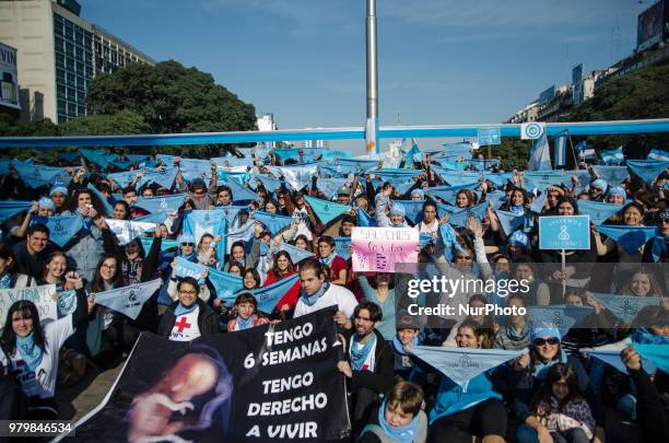 People demonstrate in rejection of the decriminalization of abortion in Buenos Aires, Argentina, on 20 June 2018 with the 'save the two lives'. A...