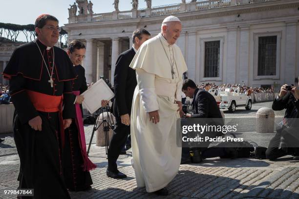Pope Francis arrives to lead his Weekly General Audience in St. Peter's Square in Vatican City, Vatican on June 20, 2018.