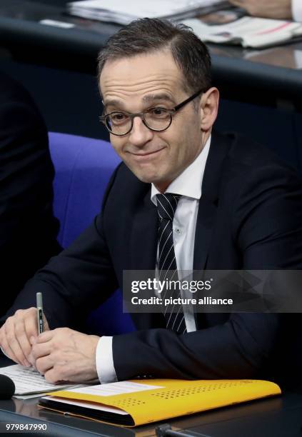 Dpatop - German Foreign Minister Heiko Maas smiles during a session of the German parliament at the Bundestag in Berlin, Germany, 15 March 2018....