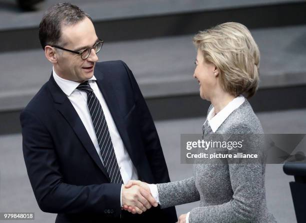 Dpatop - German Defence Minister Ursula von der Leyen shakes hands with German Foreign Minister Heiko Maas during a session of the German parliament...