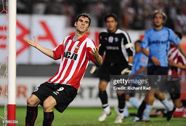Mauro Boselli of Argentina's Estudiantes reacts after missing an opportunity to score against Bolivia's Bolivar during their 2010 Copa Libertadores...