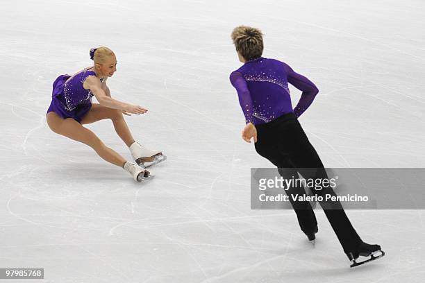 Stacey Kemp and David King of Great Britain fall in the Pairs short program during the 2010 ISU World Figure Skating Championships on March 23, 2010...