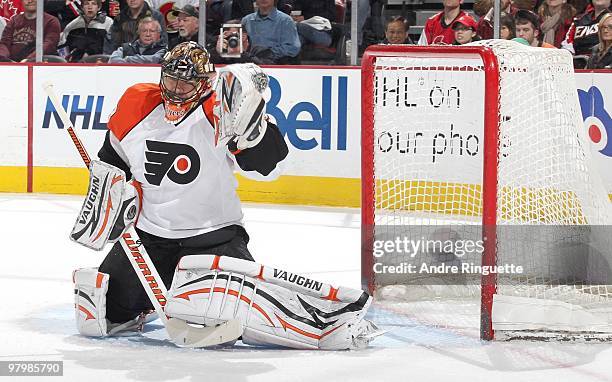 The puck hits the back of the net as Brian Boucher of the Philadelphia Flyers gives up a first period goal by Chris Kelly of the Ottawa Senators at...