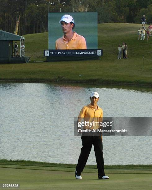 Adam Scott walks the 18th fairway during final-round play at the PGA Tour's Players Championship March 28, 2004.