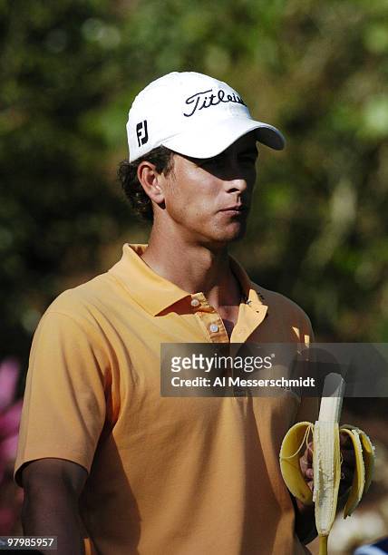 Adam Scott waits to tee off wih a banana in hand during final-round play at the PGA Tour's Players Championship March 28, 2004.
