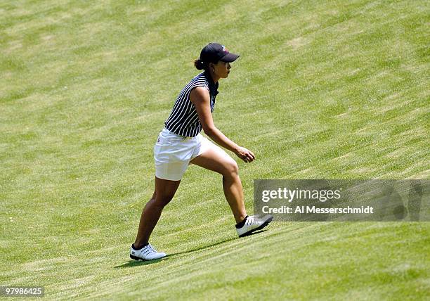Se Ri Pak climbs the hill to the 16th green and wins the LPGA Michelob Ultra Open in Williamsburg, Virginia, May 9, 2004.