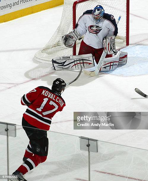 Ilya Kovalchuk of the New Jersey Devils blasts the puck past goaltender Steve Mason of the Columbus Blue Jackets for a second-period power play goal...