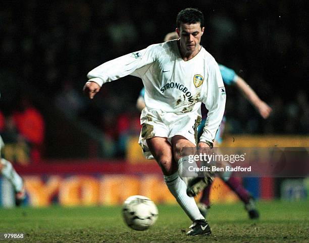 Ian Harte of Leeds scores the winner from the penalty spot during the match between Aston Villa and Leeds United in the FA Carling Premiership at...