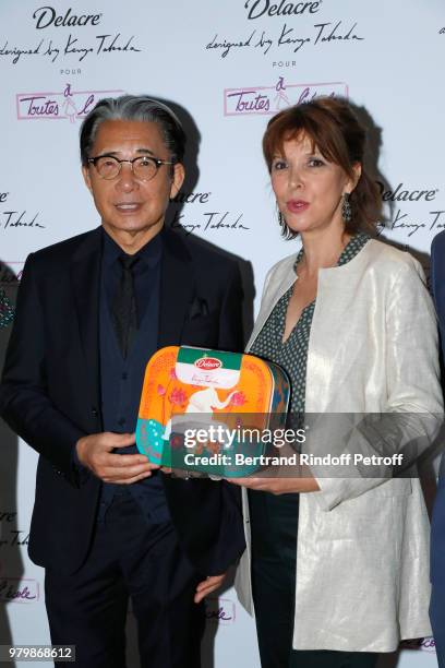 Stylist Kenzo Takada and Creator of the Association "Toutes a l'Ecole" Tina Kieffer attend the "Lost in the jungle paradise" - Delacre Collection...