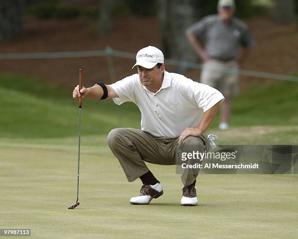 Loren Roberts lines up a putt during first-round play at the FedEx St. Jude Classic May 27, 2004 at the Tournament Players Club Southwind, Memphis,...